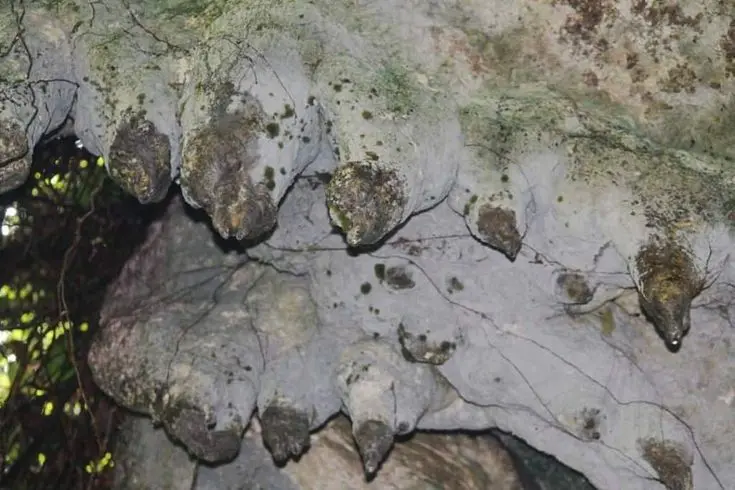 Exploring the Amabere Caves near Ruboni Tourism Village