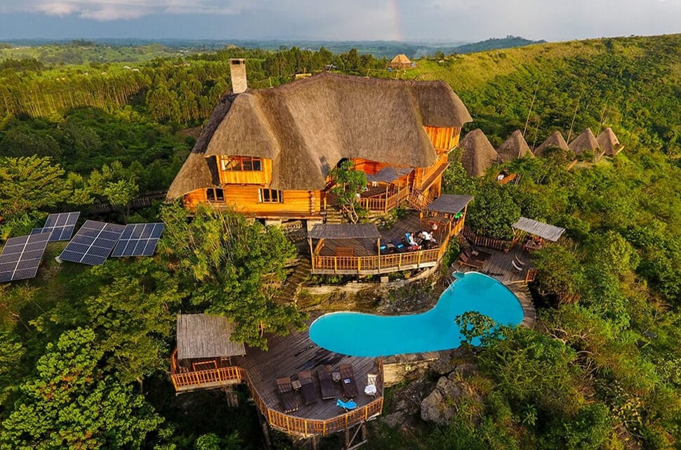 Panoramic view of a private luxury safari lodge overlooking the African bush during a luxury safari in Uganda with Afraeka Adventures.