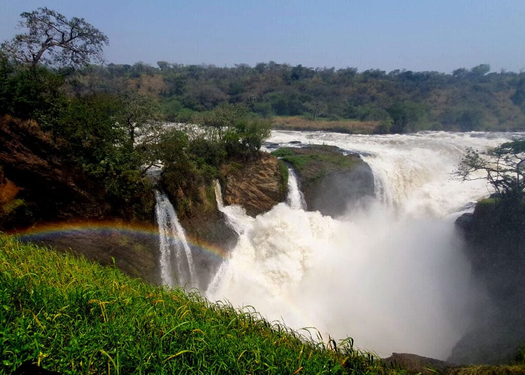 The powerful Murchison Falls crashing through a 6-meter gorge during a safari in Uganda Murchison Falls with Afraeka Adventures.