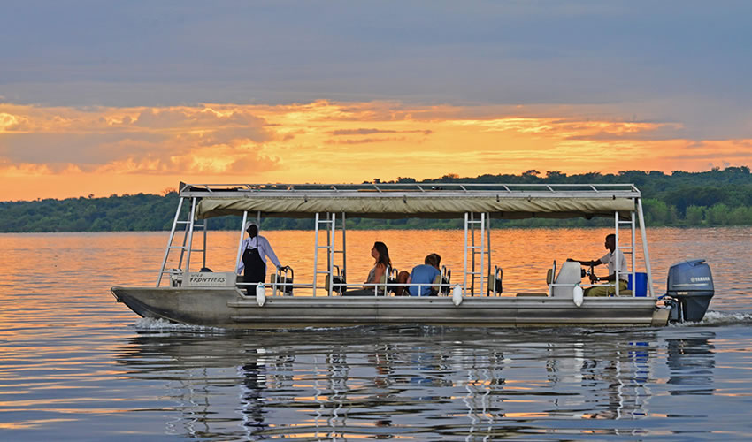 A boat cruise approaching Murchison Falls on a 4 day Murchison Falls boat cruise and chimpanzee tracking Budongo Forest safari