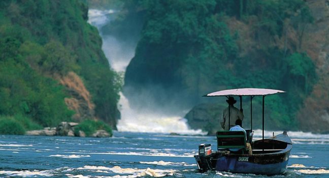 A boat cruise approaching the base of Murchison Falls on a 5 day Murchison Falls National Park safari itinerary