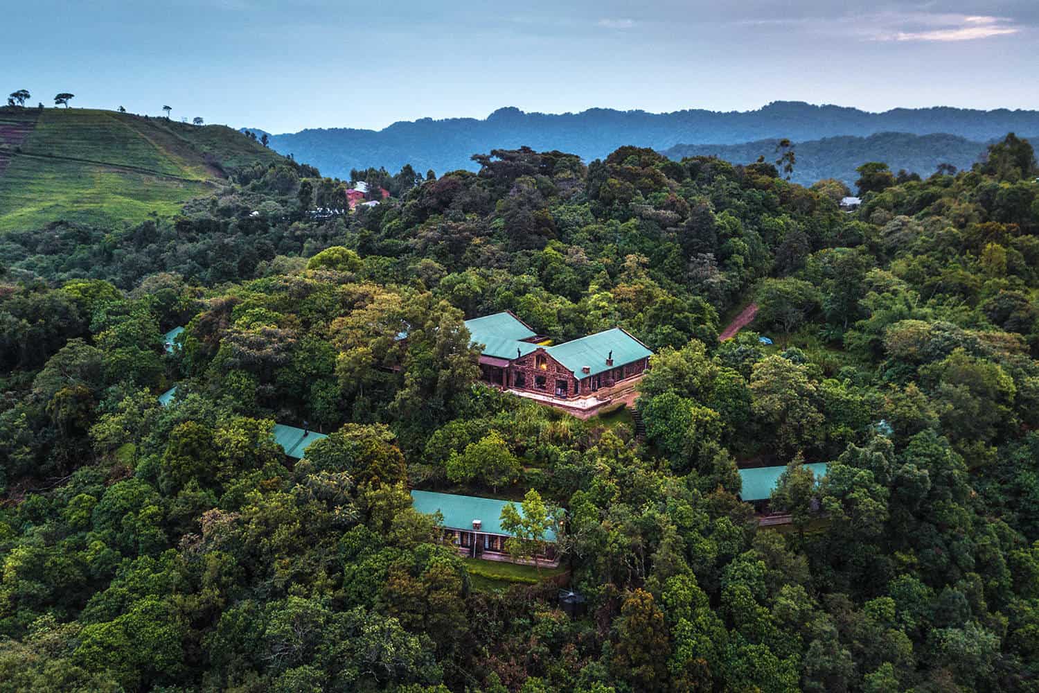 Clouds Mountain Gorilla Lodge with views of Virunga Volcanoes on a 5 day luxury fly-in gorilla safari staying at Clouds Mountain Gorilla Lodge