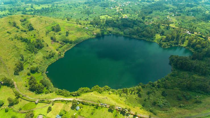 A stunning crater lake in Queen Elizabeth National Park on a 5 day crater lakes and lion tracking research safari