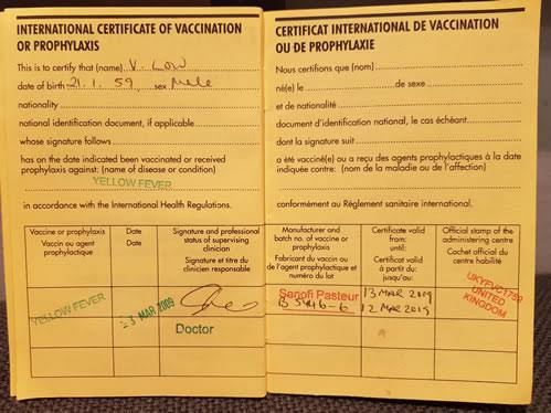 Yellow Fever Card at Entebbe Airport: Entry Requirements and Strict Rules (2026/2027 Guide) 4 Health officials checking yellow fever cards at Entebbe Airport in Uganda