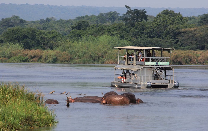 A boat cruise to Murchison Falls on a 10 day best of Uganda safari itinerary Murchison Falls Kibale Bwindi Mburo