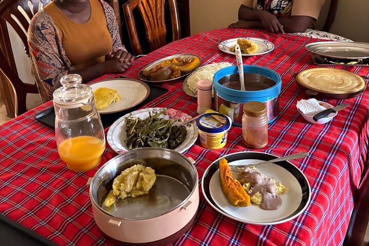 Afraeka Adventures cooking class – participants preparing Ugandan food