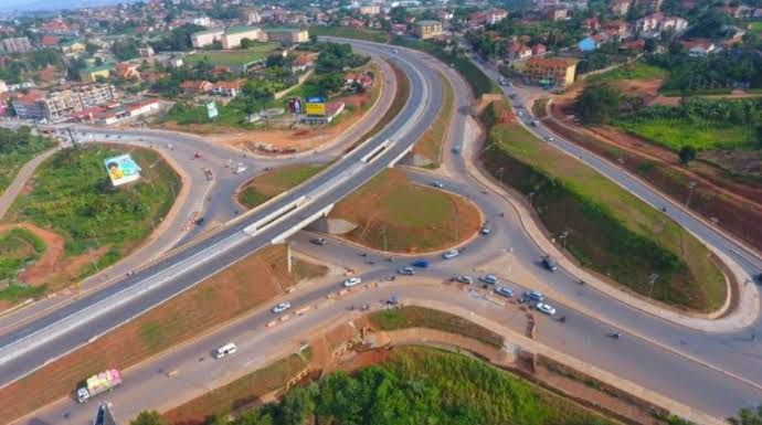 Driving in Kampala traffic foreign driver tips – boda boda weaving through Kampala traffic