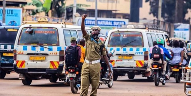 Driving in Uganda police bribe traffic stop – 4x4 vehicle stopped at a police checkpoint