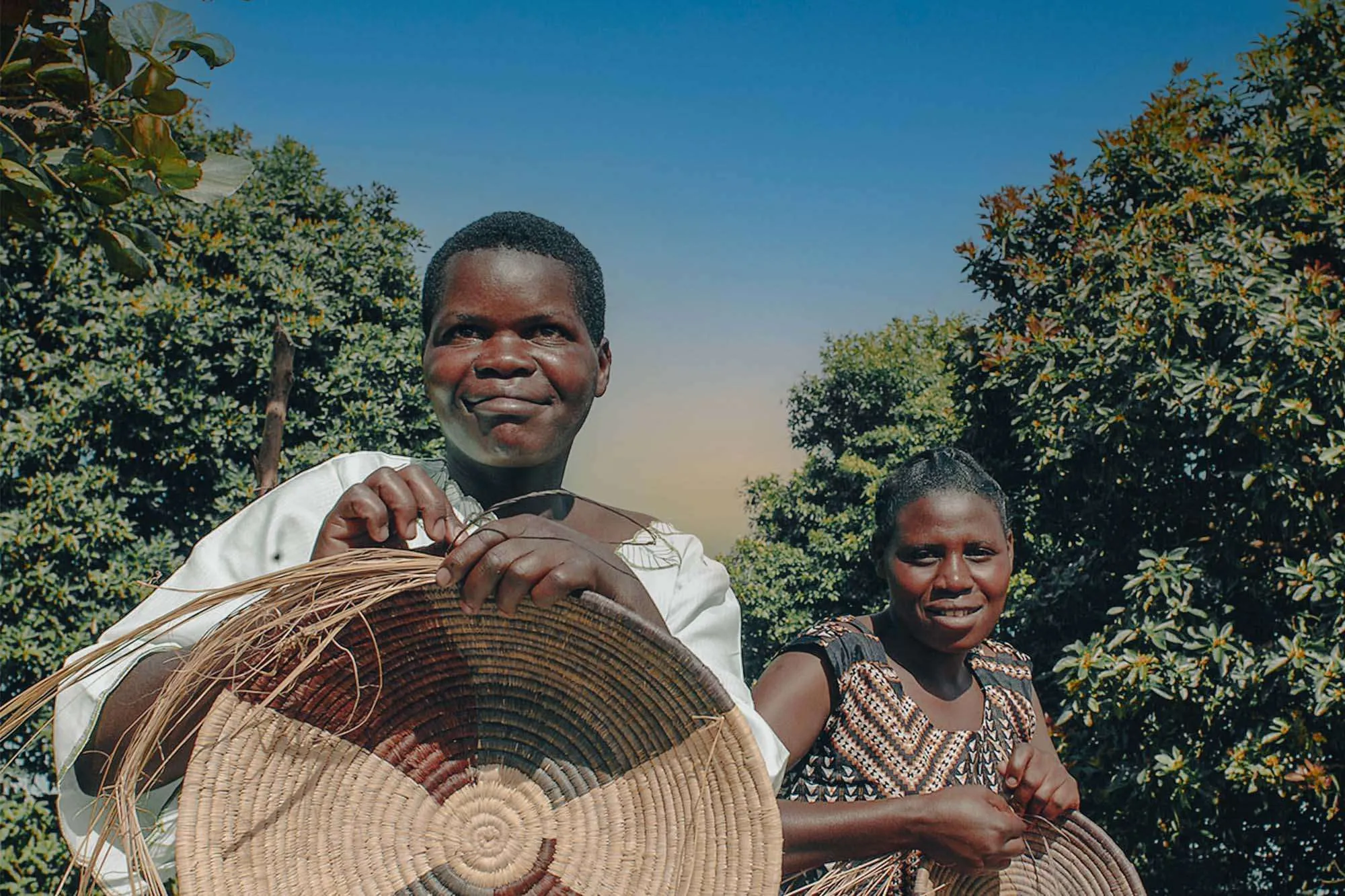 Ethics of photographing children village tours Uganda – traveler asking permission before photographing