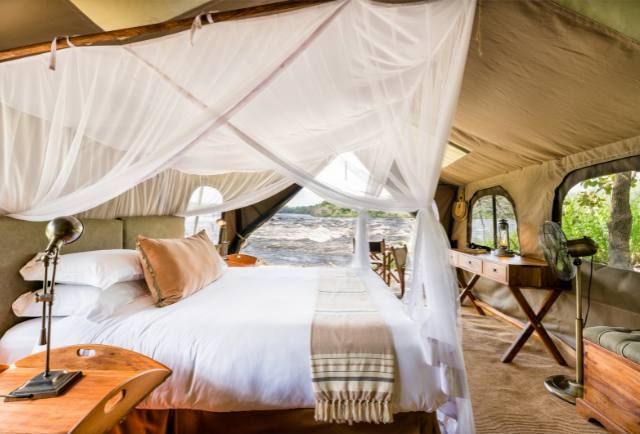 Hot water flush toilet facilities Uganda safari camps – safari camp exterior with facilities