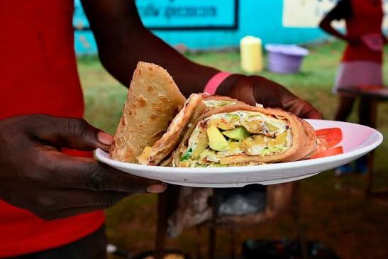 Is eating rolex street food safe Uganda – rolex being cooked fresh on a grill