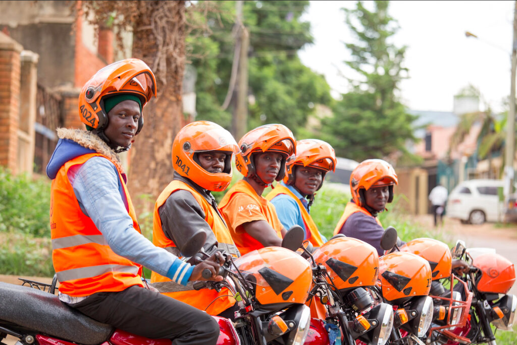 Kampala nightlife safety for tourists – SafeBoda motorcycle taxi with rider