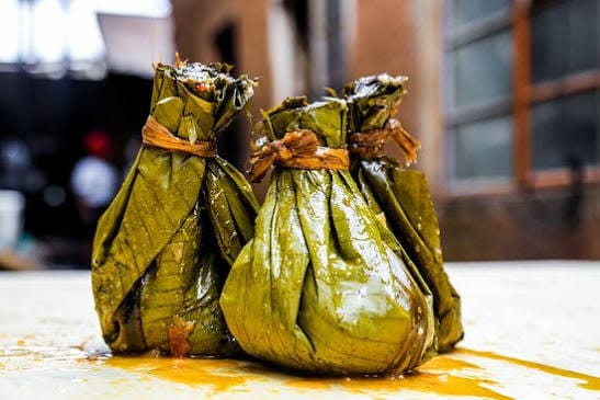 Luwombo traditional Ugandan dish – stewed meat in banana leaves