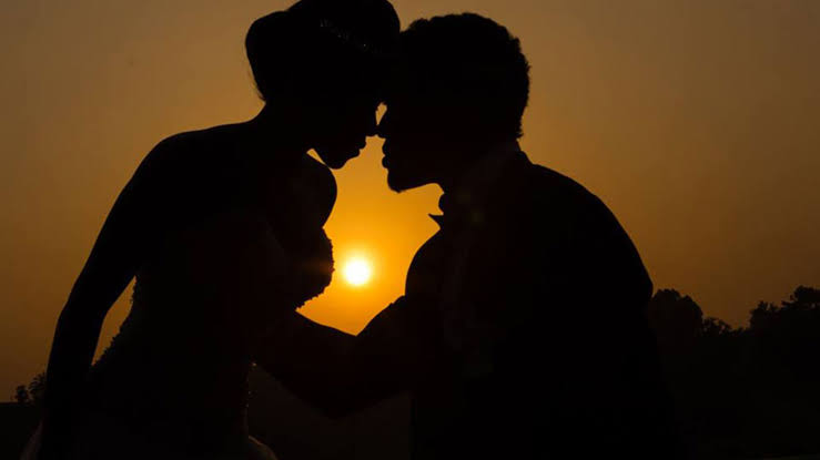 Public display of affection rules Uganda tourism – couple in rural Uganda