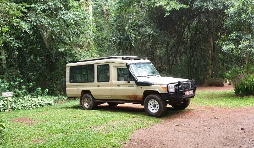 Self drive Uganda gorilla trekking 4x4 rental – 4x4 vehicle on a Ugandan safari road
