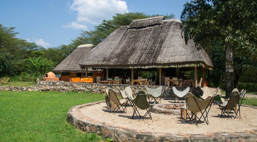 Solar power wifi schedule safari lodges Uganda – eco-lodge exterior with solar panels