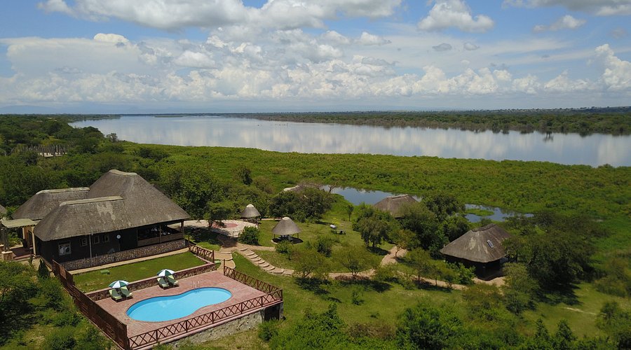 Solar power wifi schedule safari lodges Uganda – power outlets in a safari lodge room