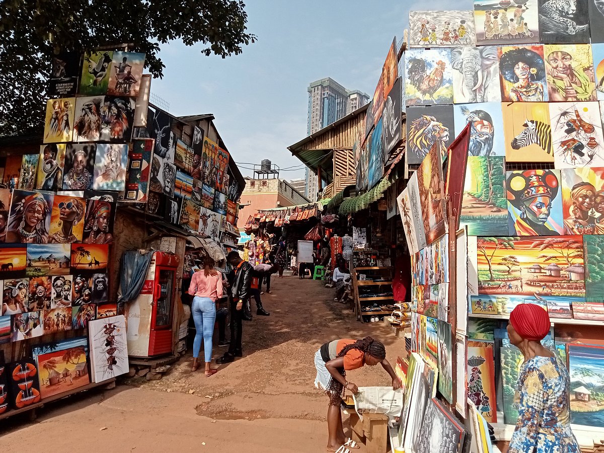 Solo female traveler exploring a local craft market in Kampala during solo female travel Uganda cultural tour