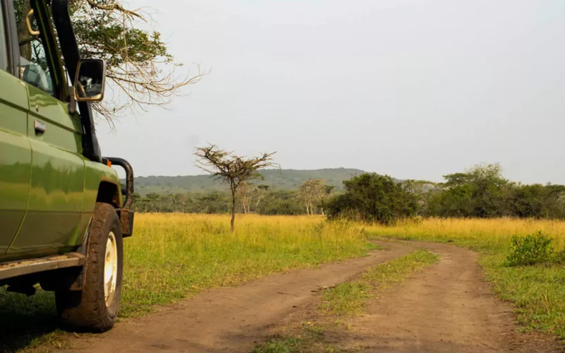 Tipping park ranger guide Uganda game drive – safari vehicle with guide in Uganda