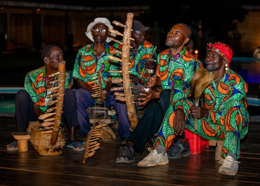 Tipping traditional dancers safari lodge performance – traditional dancers at a Uganda safari lodge