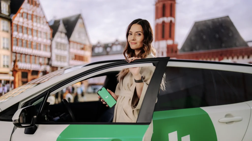 Uber Bolt app Entebbe airport taxi reliability – Bolt app on a smartphone at Entebbe Airport