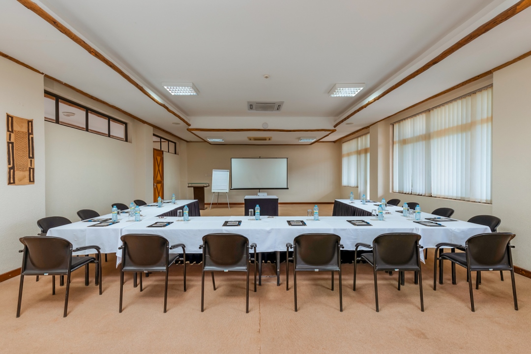 Corporate team building on a game drive at Uganda safari lodges with meeting rooms for corporate retreats
