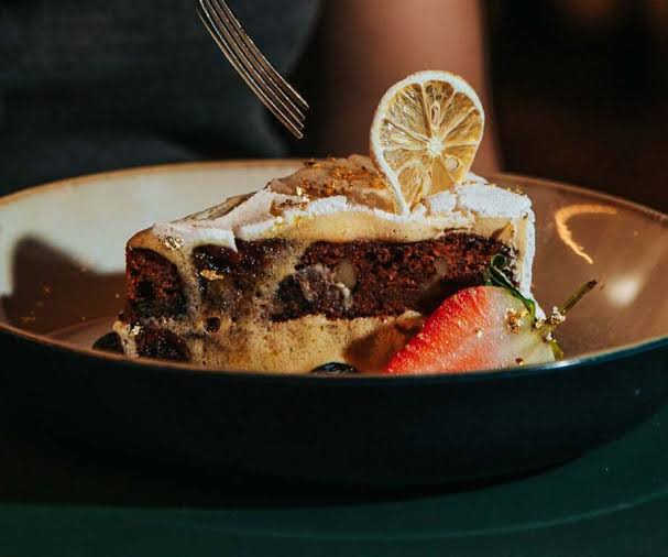 Vegan coconut panna cotta dessert – one of the vegan and vegetarian meal options in Bwindi lodges