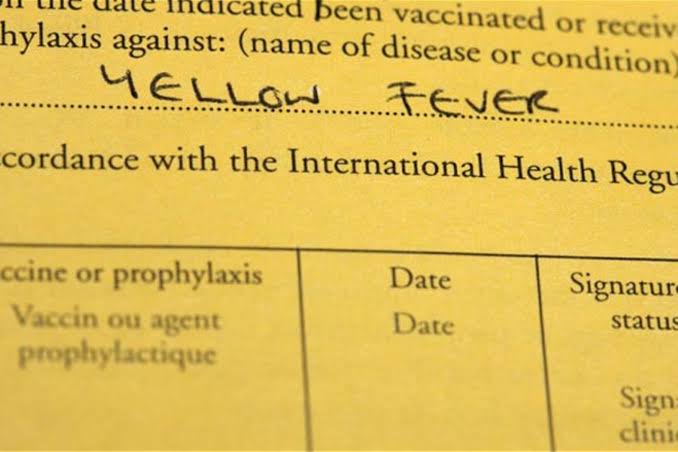 Yellow fever vaccine exemption certificate for Uganda entry – WHO Yellow Card with medical contraindication stamp