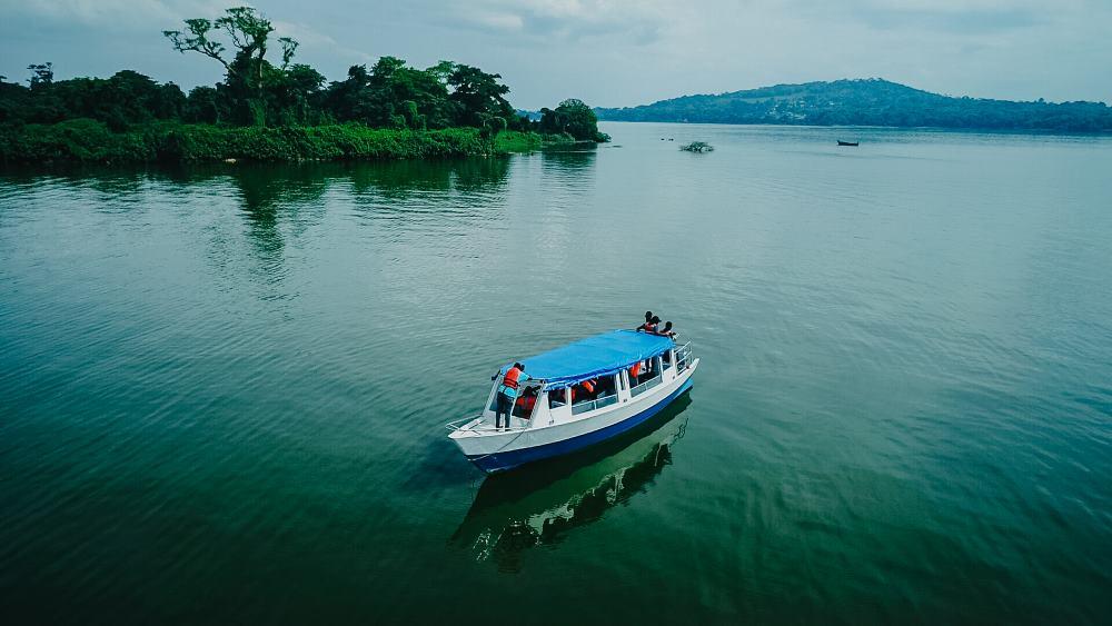 Trekkers boarding the boat from Entebbe to Ngamba Island chimpanzee sanctuary