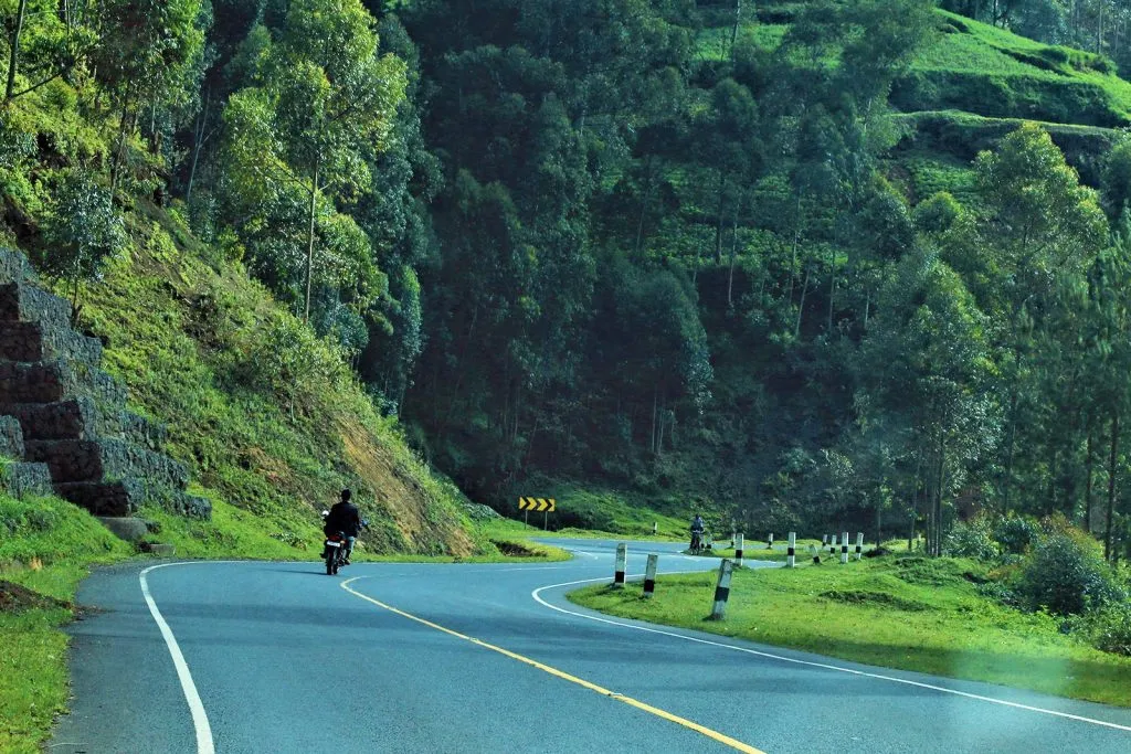 Vehicle on the road between Kibale and Bwindi on a combined safari