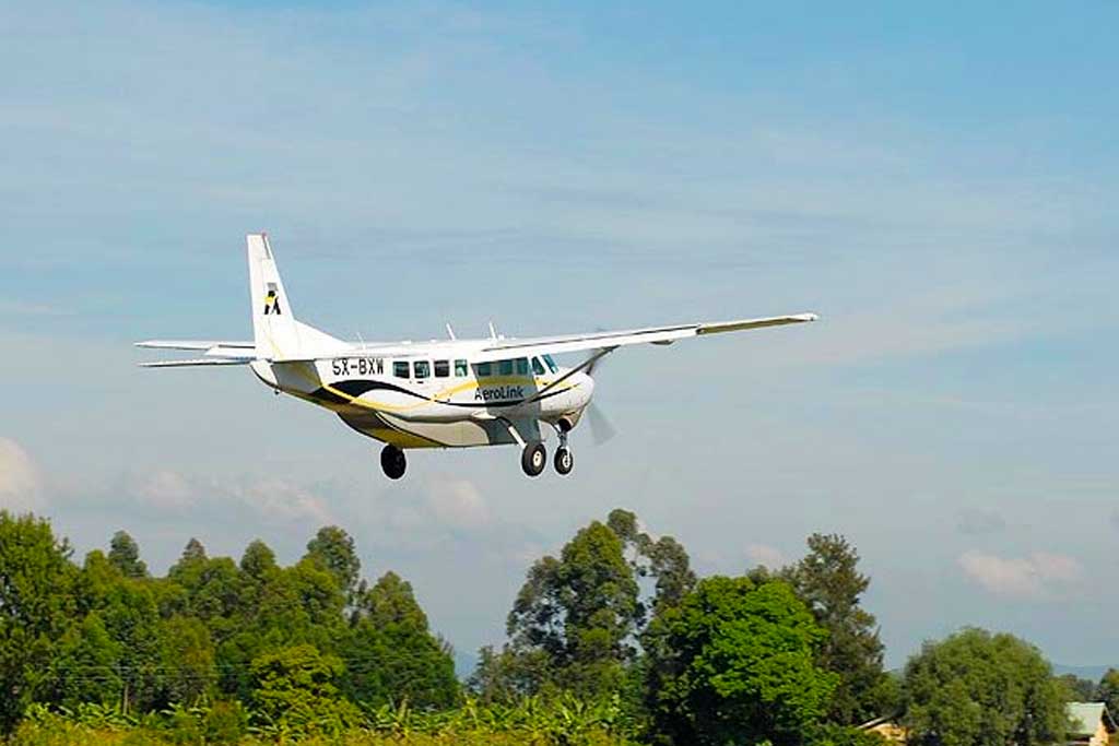 Transfer vehicle at Kihihi airstrip meeting gorilla trekking guests