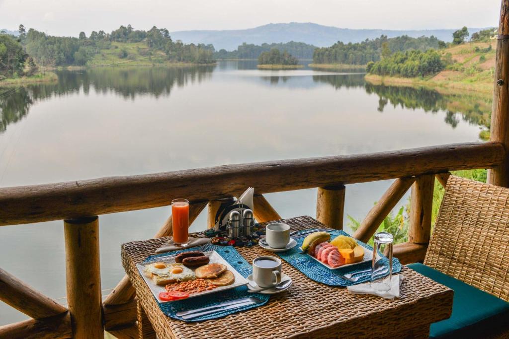Lakeside lodge deck overlooking Lake Bunyonyi on the buffer day