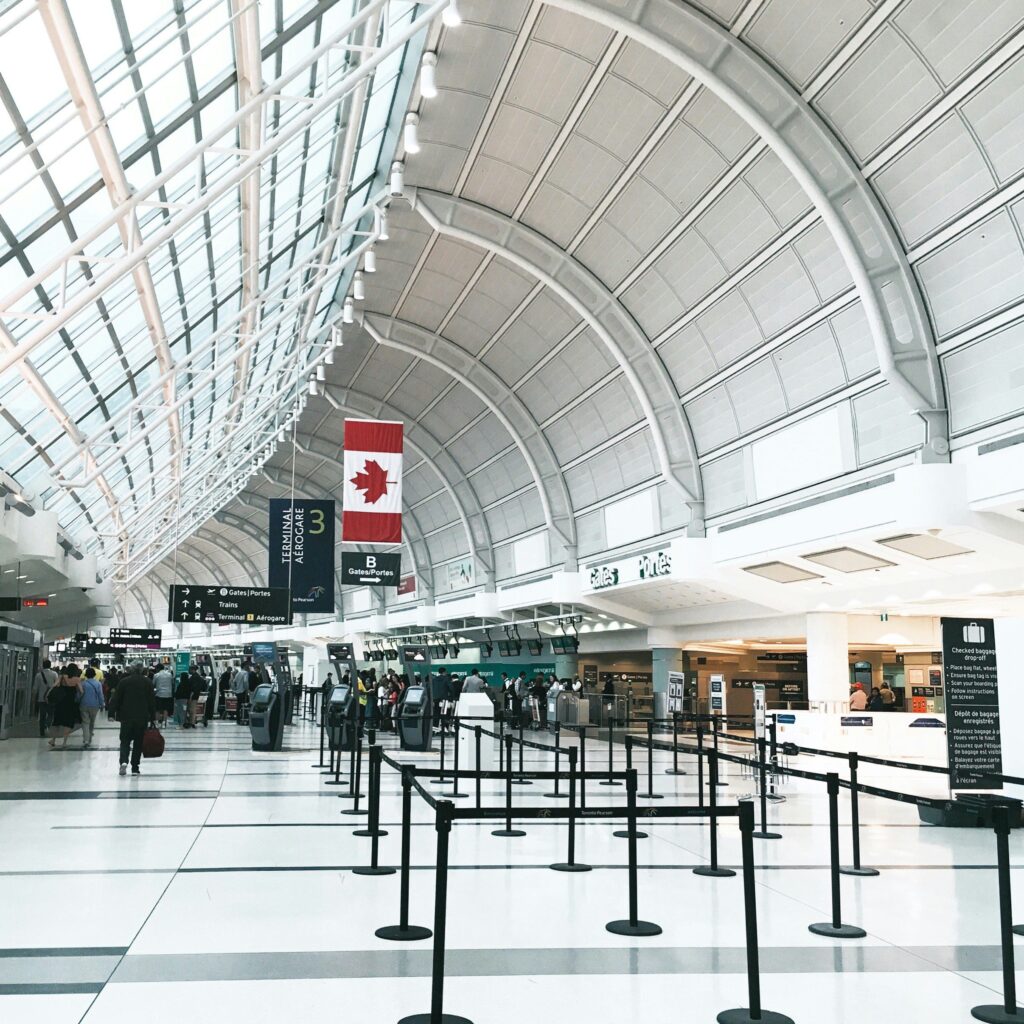 Travelers at Toronto Pearson Airport before a Uganda gorilla safari from Canada