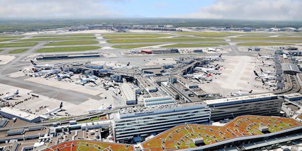 Travelers at Frankfurt Airport before a Uganda safari from Germany