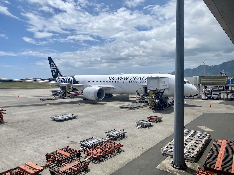Travelers at Auckland Airport before a Uganda safari from New Zealand