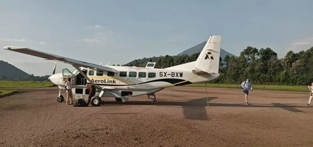 Light aircraft on the tarmac at Kajjansi Airfield before Kajjansi to Kihihi flight schedule Kajjansi to Kihihi flight schedule